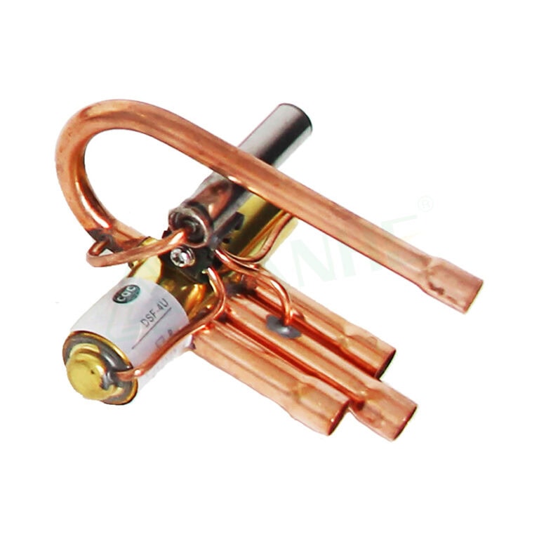 Close-up of a HVAC compressor component with copper tubing and motor for air conditioning units.